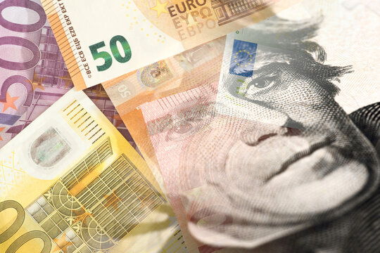 Dollar and euro banknotes as a symbol of trade between the US and the European Union
