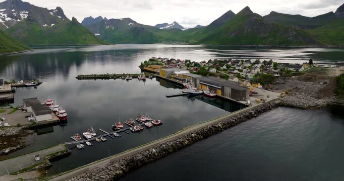 Drone view over causeway between Senja and quaint Husoy island fishing village