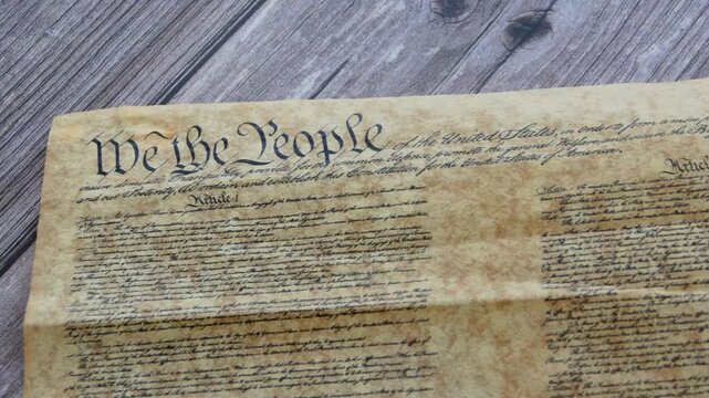 Reading the US Constitution honoring American freedom liberty democracy patriotism and the enduring spirit of the founding fathers and the United States Republi