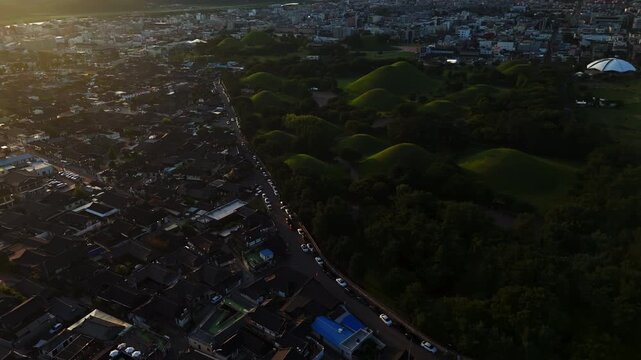 Scenic drone reveal of Daereungwon Tombs UNESCO World Heritage Site in Gyeongju
