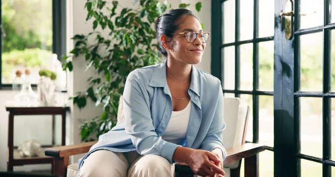 Happy, thinking and face of woman in home for resting, calm and daydreaming to relax on weekend. Laugh, glasses and person with thoughtful, wondering and reflection for positive mindset in house