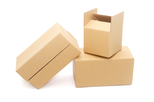 Three cardboard boxes againt white background,