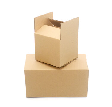 Three cardboard boxes againt white background,