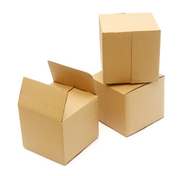 Three cardboard boxes againt white background,