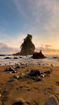 Sunset during summer at Karang Agung beach, Indonesia