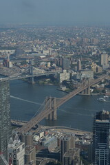 Obraz premium Elevated View Of Brooklyn Bridge During Sunrise Showcasing Heritage And Urban Serenity new york