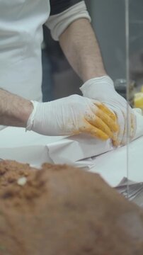 Professional Chef Rolling a Traditional Turkish Cig Kofte Wrap