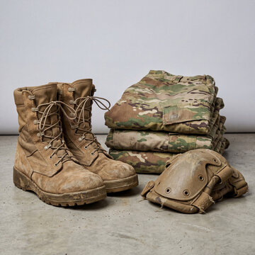 Tactical military boots and camouflage uniform set, rugged tan combat footwear with multicam apparel, professional army gear and protective knee pads isolated on White Background
