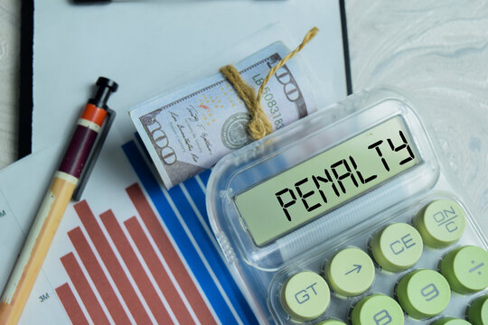Penalty text on calculator. Financial, economy and business concept