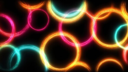 Naklejka premium Abstract neon circles in vibrant colors create a dynamic, glowing design on a dark backdrop.