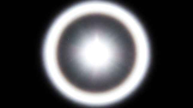 Bright White Halo Ring Flare Glow Effect with Subtle Stars on Black Background