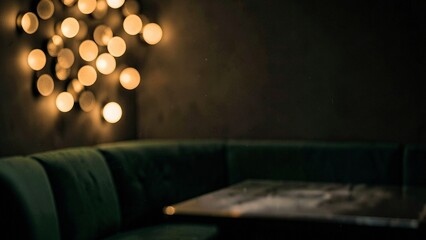 Fototapeta premium Plush velvet seating and dark wood surface against warm golden bokeh glow