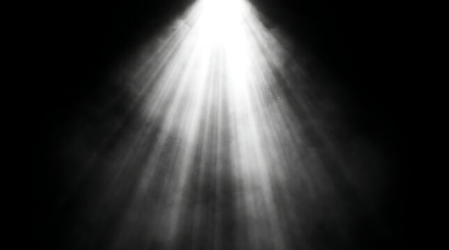 Bright White Spotlight Beam Shining Upward Through Smoke Against Black Background