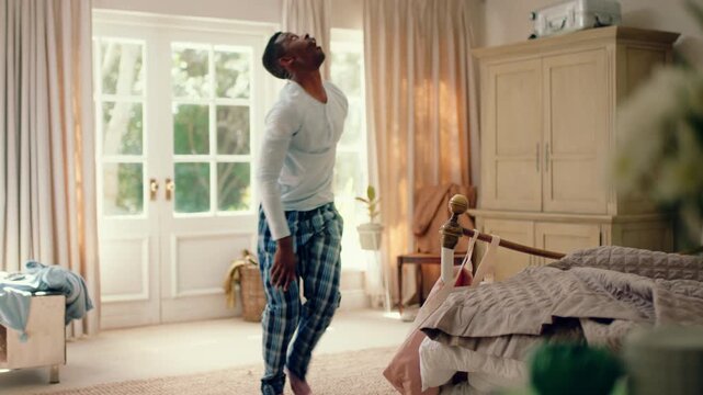 Dancing, hip hop and black man in home with energy for celebration, performance or practice. Happy, movement and male person with expression for hobby, entertainment and morning fun in pyjamas