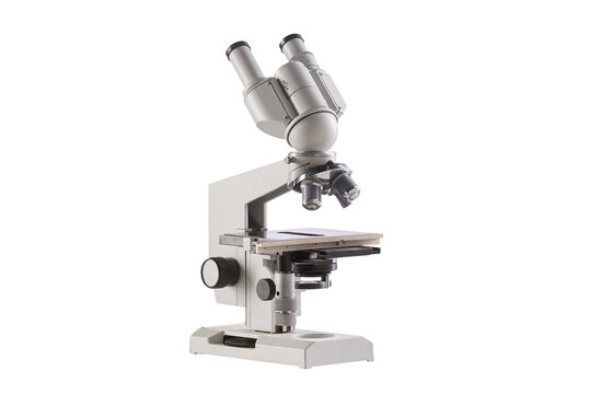 Silver microscope stands against clean white background