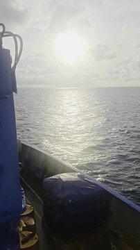 Scenic Ocean Horizon at Sunset from a Boat Deck