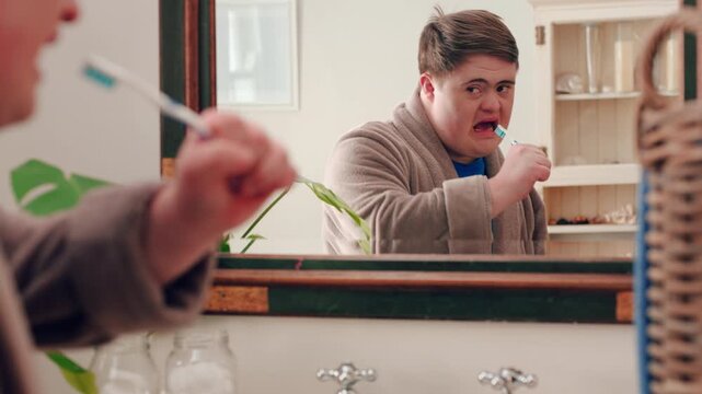 Mirror, sing and person with toothbrush for oral hygiene, wellness and grooming with dancing in bathroom. Rhythm, reflection and dancer with down syndrome, celebration and dental care in house