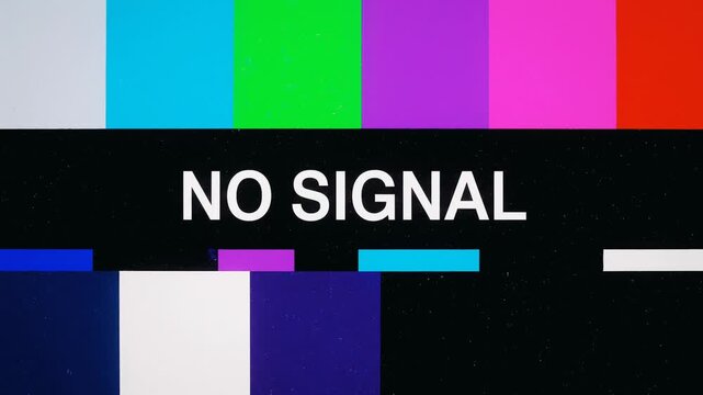 A television screen displaying a classic color bar test pattern with the text 'NO SIGNAL' indicating a broadcast interruption or technical issue.