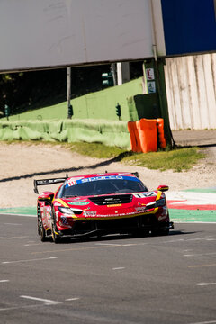 Ferrari GT car racing action on asphalt track