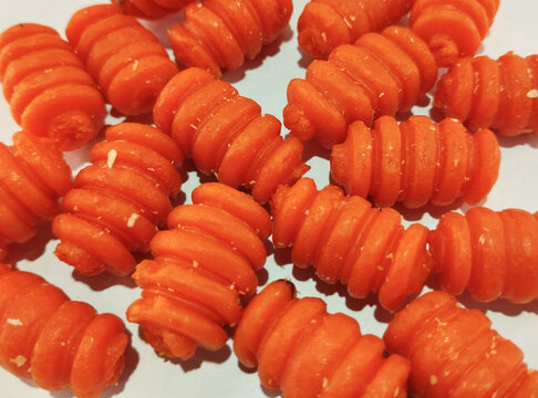 Savory Pile of Orange Spiral Corn Snacks