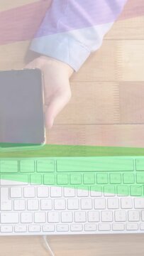 Vertical video: Tap starting hands holding phone, right finger tapping and swiping while showing UI