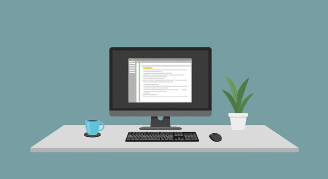 Computer desk with coding software, coffee cup, and potted plant