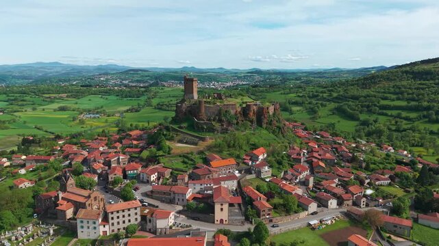 Aerial shot around Polignac Castle near Le Puy en Velay on a sunny day in Haute Loire departement, Auvergne Rhone Alpes region, France