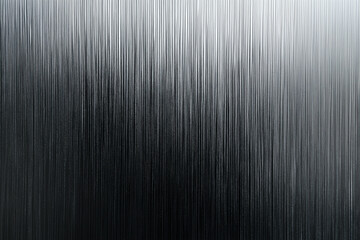 Fototapeta premium Black metal panel with minimal reflective surface shows streaks and textures in a modern setting during daylight hours