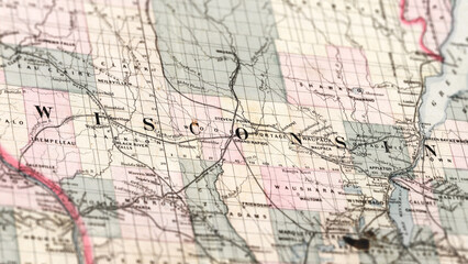 Fototapeta premium Macro View of Vintage Map Highlighting Wisconsin USA with Detailed Geographic Cartography.