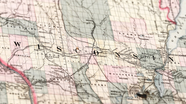 Macro View of Vintage Map Highlighting Wisconsin USA with Detailed Geographic Cartography.