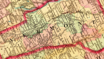 Fototapeta premium Macro View of Vintage Map Highlighting Vermont USA with Detailed Geographic Cartography