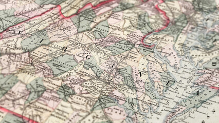 Fototapeta premium Macro View of Vintage Map Highlighting Virginia USA with Detailed Geographic Cartography