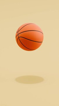 Floating Basketball Ball Spinning on Brown Background with Copy Space, Vertical Seamless Loop 3D Animation