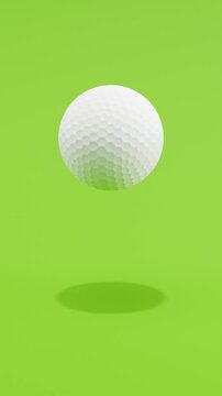 Floating Golf Ball Spinning on Green Background with Copy Space, Vertical Seamless Loop 3D Animation