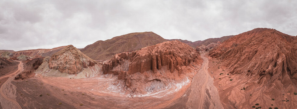 Expansive panoramic view of colorful desert valley