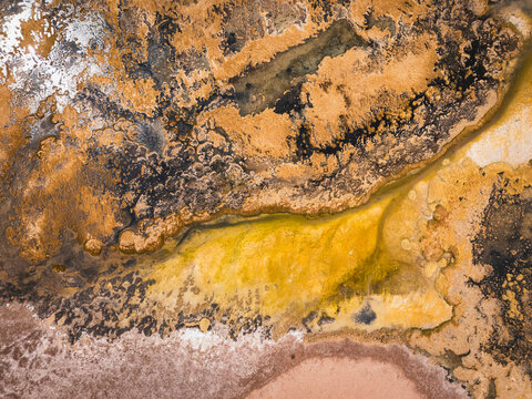 Aerial view of colorful geothermal mineral deposits