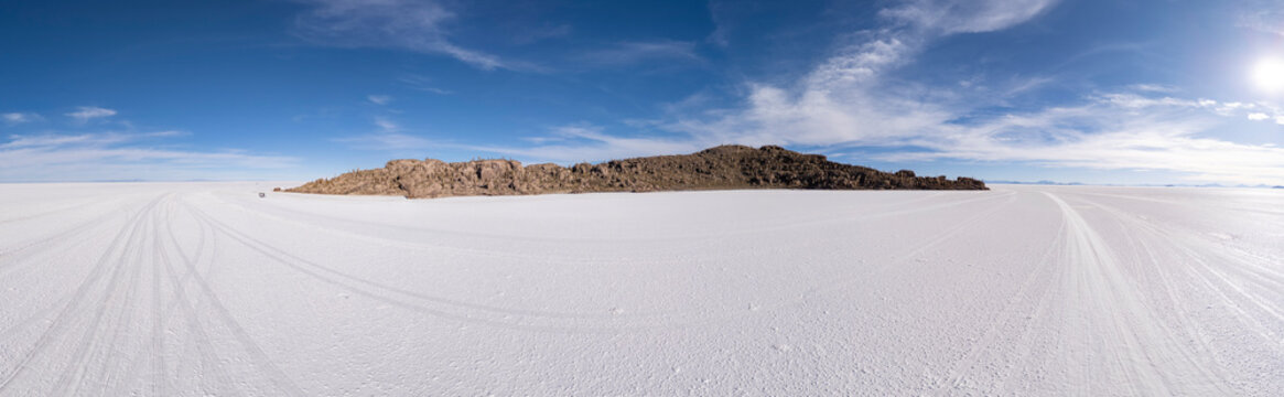 Panoramic view of a rocky island in vast salt flats