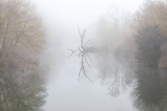 Misty river reflection in Spain