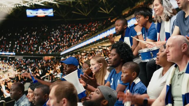 Multigenerational soccer fans watching tense moment from crowded stadium stands, decisive moment of intensity and anxiety with crowd energy.