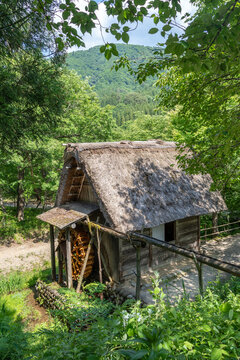 Traditional watermill surrounded by nature in Shirakawa-go, Japan