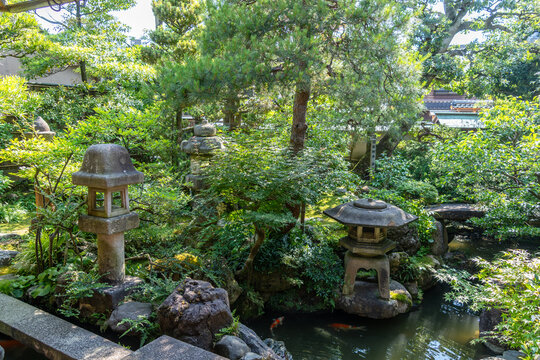 Traditional garden in Nagamachi District, Kanazawa, with stone lanterns