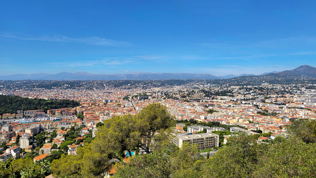 Nice city and coastline panoramic view from Mont Boron, Provence-Alpes-Cote d'Azur France, Europe. Nice cityscape stretching along the bay Baie des Anges and port, Maritime Alps, France, Europe.