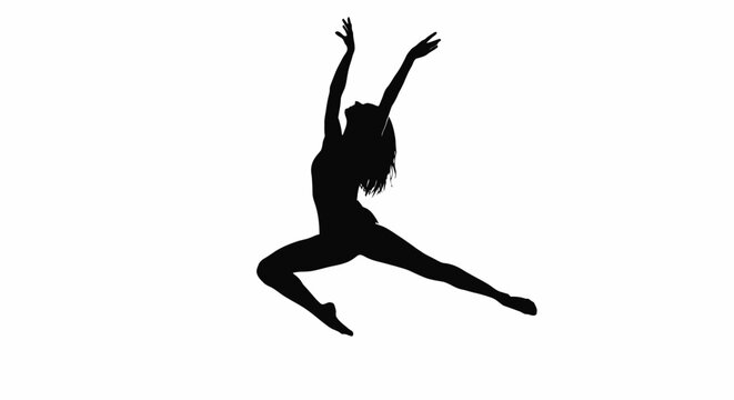 Silhouette of a graceful woman performing a ballet jump.