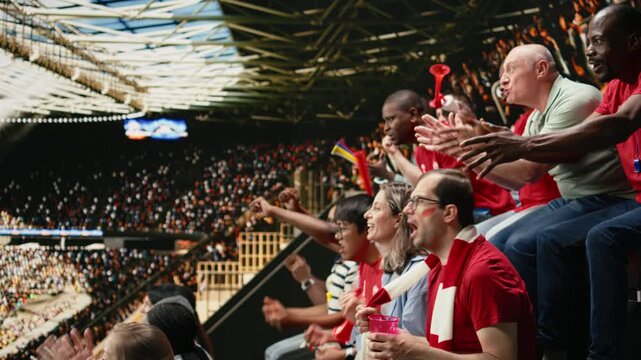 Red team soccer fans reacting to close call in stadium stands, hands on head, scarves and anxious crowd during live football match, anxious supporters show tension and suspense, inclusive fans.