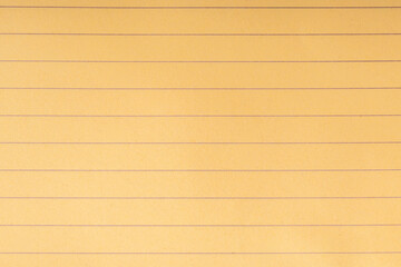 Naklejka premium yellow lined notebook paper background