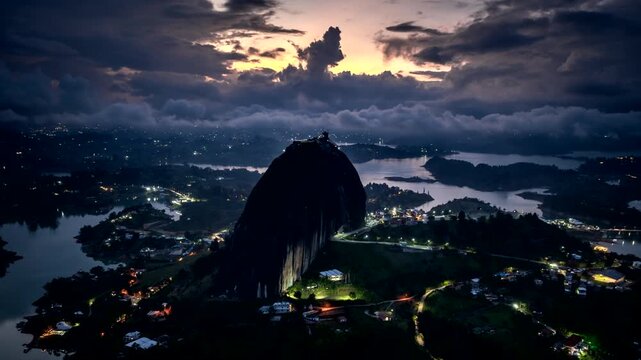 Drone hyperlapse view of low clouds and twilight sky around El Penol, Guatap&eacute;