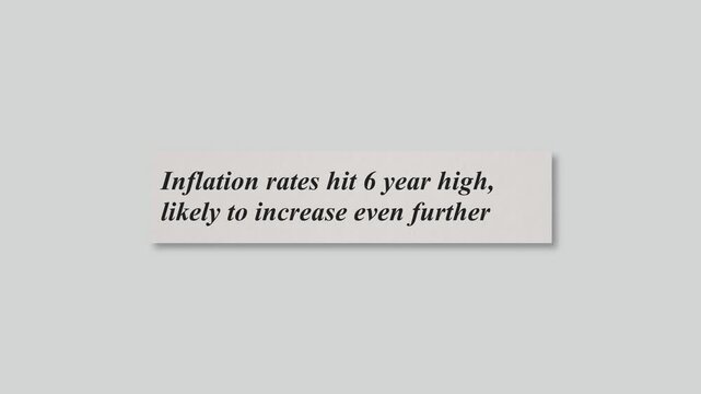 Newspaper Headline About Inflation Economic Pressure and Rising Costs