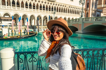 Smiling woman enjoying las vegas vacation at gondola canal © unai