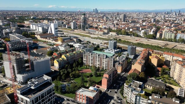 Europe , Italy , Milan - drone aerial view of Symbiosis new modern area in downtown whit new skyline and skyscrapers - Prada Foundation and Scalo Porta Romana Olympic Village 
