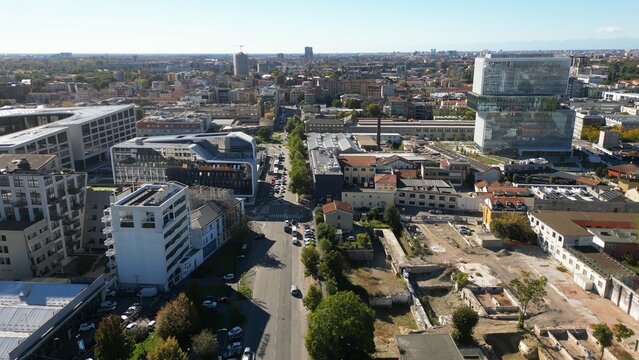 Europe , Italy , Milan - drone aerial view of Symbiosis new modern area in downtown whit new skyline and skyscrapers - Prada Foundation and Scalo Porta Romana Olympic Village 
